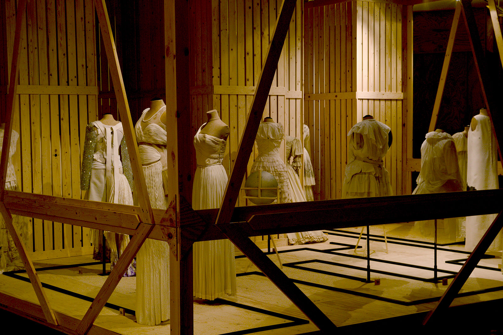 an image of an exhibition display with clothes