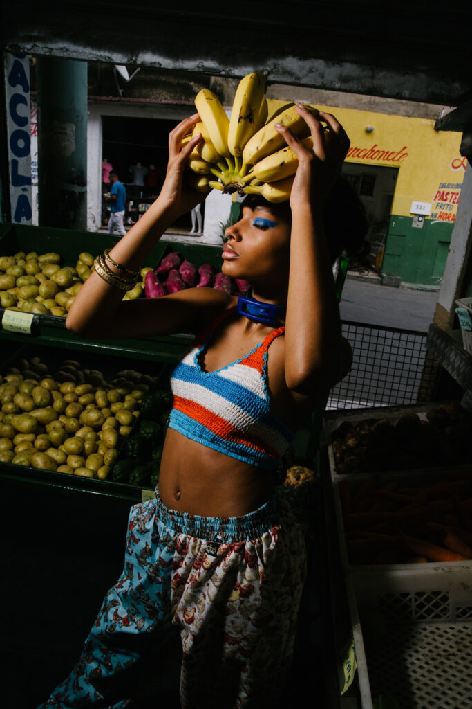 image of a woman wearing bananas in favela, brazil